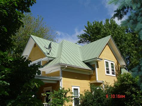 patina green metal roof one story house|green metal roof exterior homes.